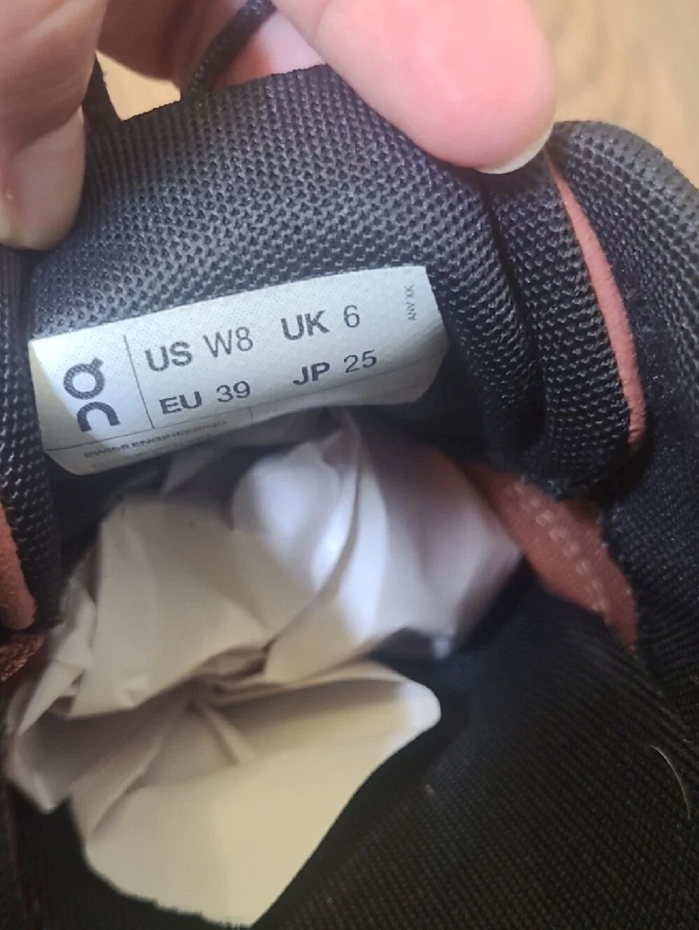 On Running women's Sneakers in Rust and Black with White CloudTec Sole w8 .